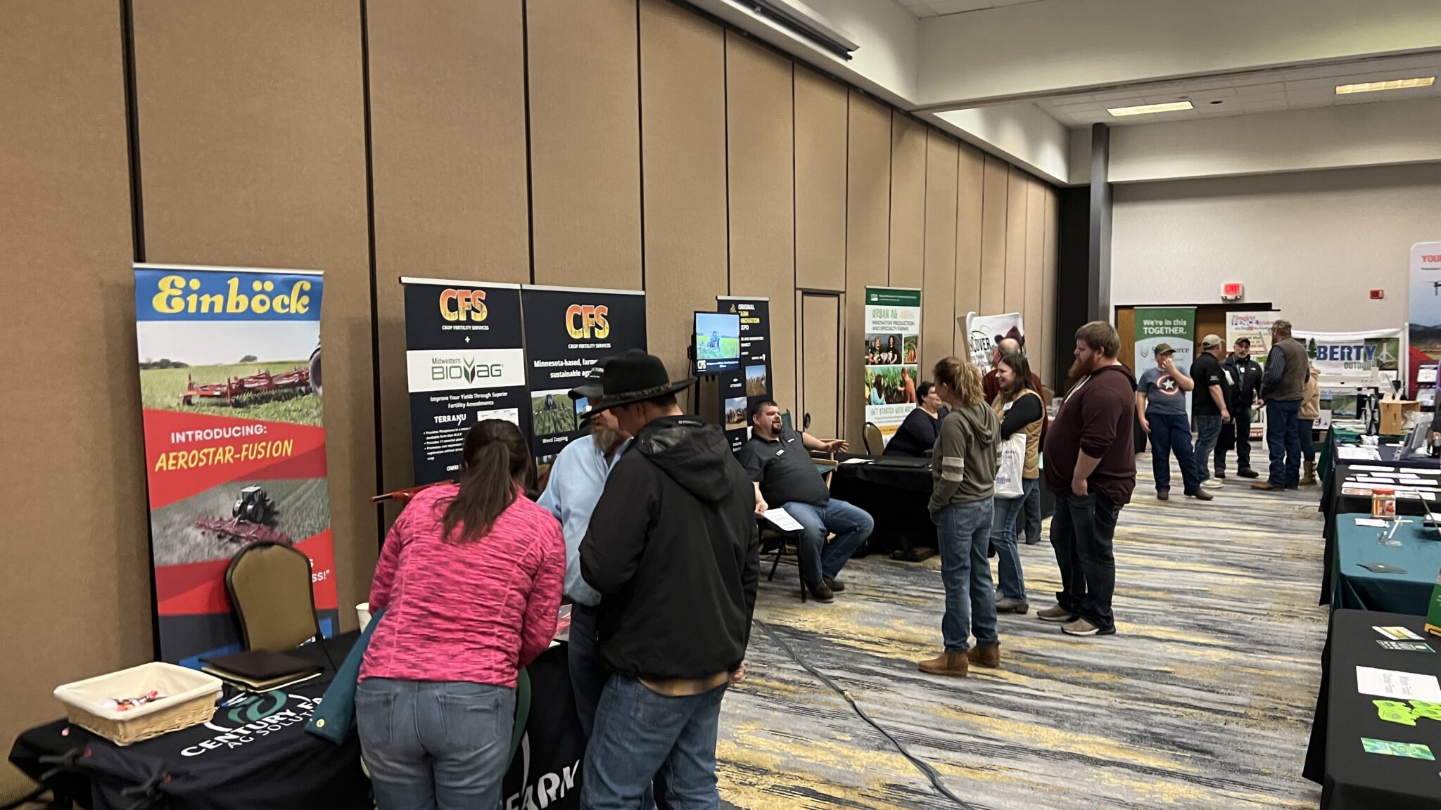 The conference sponsor booths are a popular place for attendees to talk business and see what's new in the industry